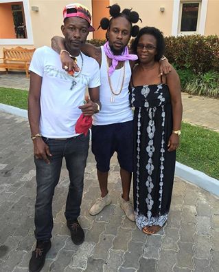 Picture Of Dancehall Artiste Popcaan And This Parents